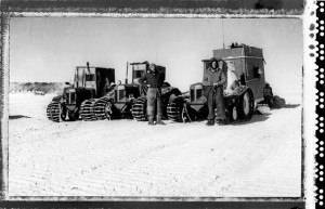  Sir Edmund Hillary, right, and Jim Bates, both of New Zealand, stand before their tractors on Jan. 4, 1958, after arrival at the American Scientific Station at the South Pole. The party of five travelled 1,200 miles with this equipment over polar snow and ice. The square box at right was Hillary's quarters and housed the expedition's radio equipment.
