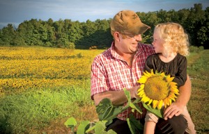 Rodney Fraser and daughter Rachel, photographed in one of the family’s sunflower fields.